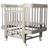 INDIGO Кровать детская Tiny (ложе 100х70, закругленные углы, продольный маятник + колеса) массив б (кашемир-кашемир)